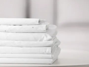 Stack of freshly folded white linens